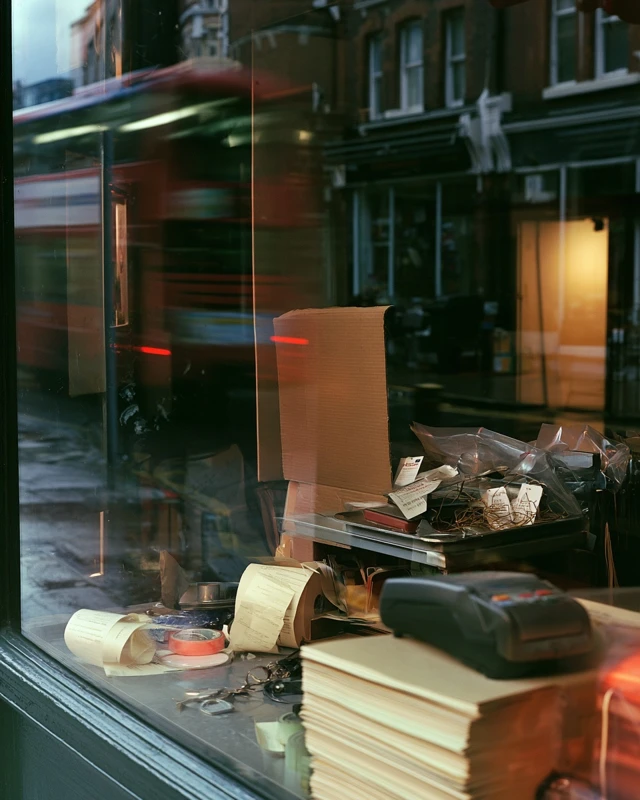 Editorial city composition with notebooks and street detail